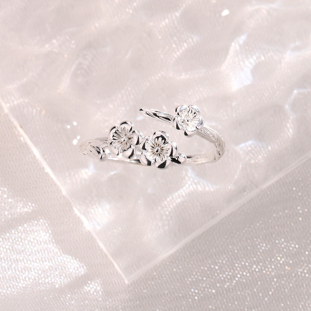 Retro Ring mit Pfirsichblüten-Design und Baumzweig-Struktur