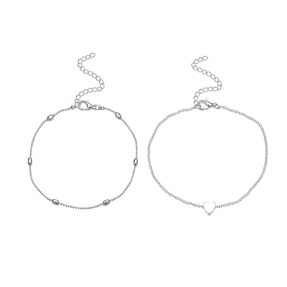 Doppellagiges Fußkettchen mit Herzdetail filigraner Sommerlook