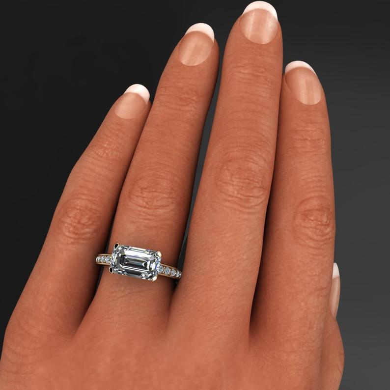 Eleganter Damen Goldring mit kleinem Diamant