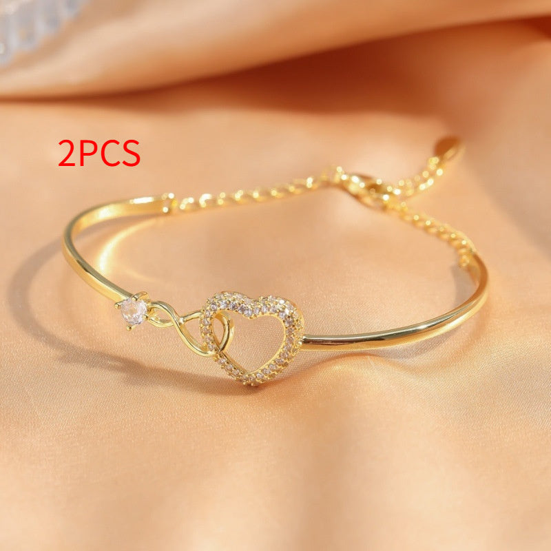 Offenes Herzarmband mit filigranem Design