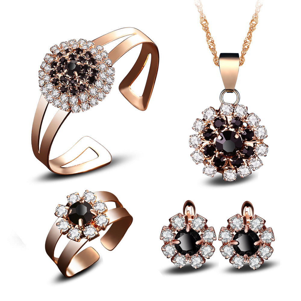 Florales Vier-teiliges Schmuckset mit Halskette, Ring, Ohrringen und Armband