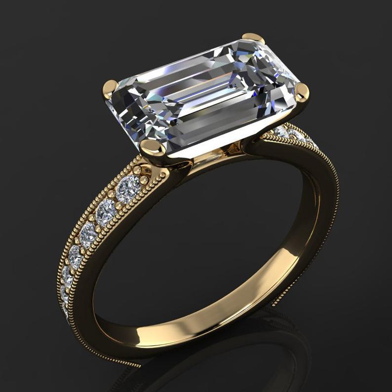 Eleganter Damen Goldring mit kleinem Diamant