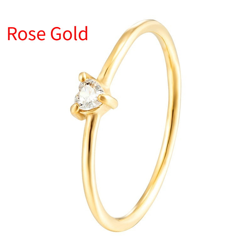 Ring mit Herzmotiv und Zirkonstein