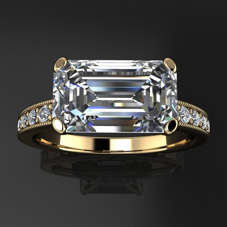 Eleganter Damen Goldring mit kleinem Diamant