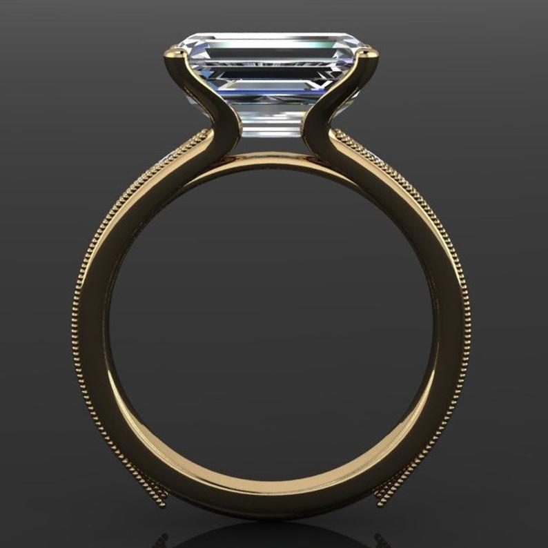 Eleganter Damen Goldring mit kleinem Diamant