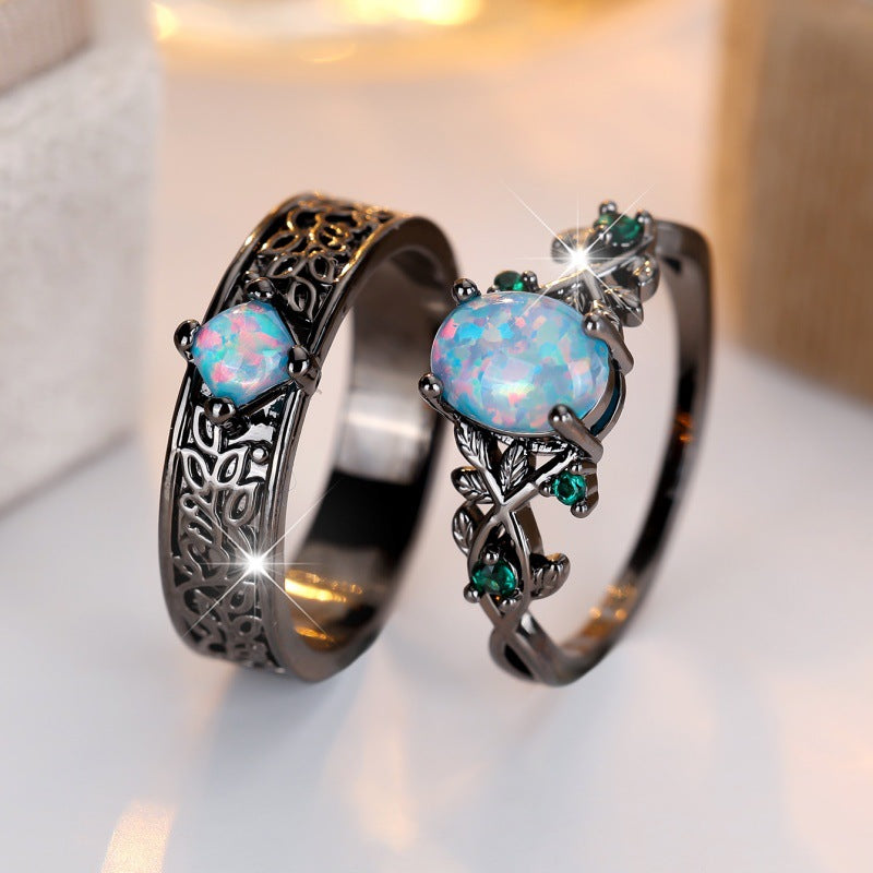 Schwarzgoldener eiförmiger Ring mit blauem Kristallsand – exklusives Partner-Ring-Set