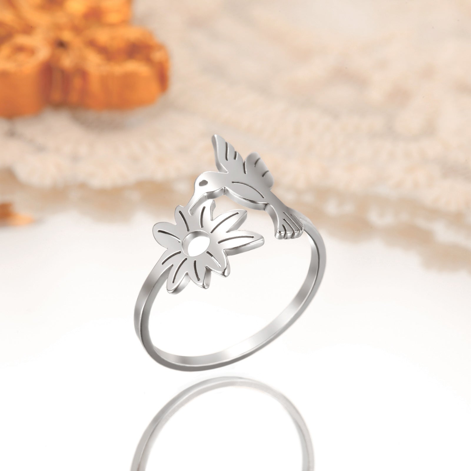 Floraler Vogelring aus Edelstahl im japanisch inspirierten Design