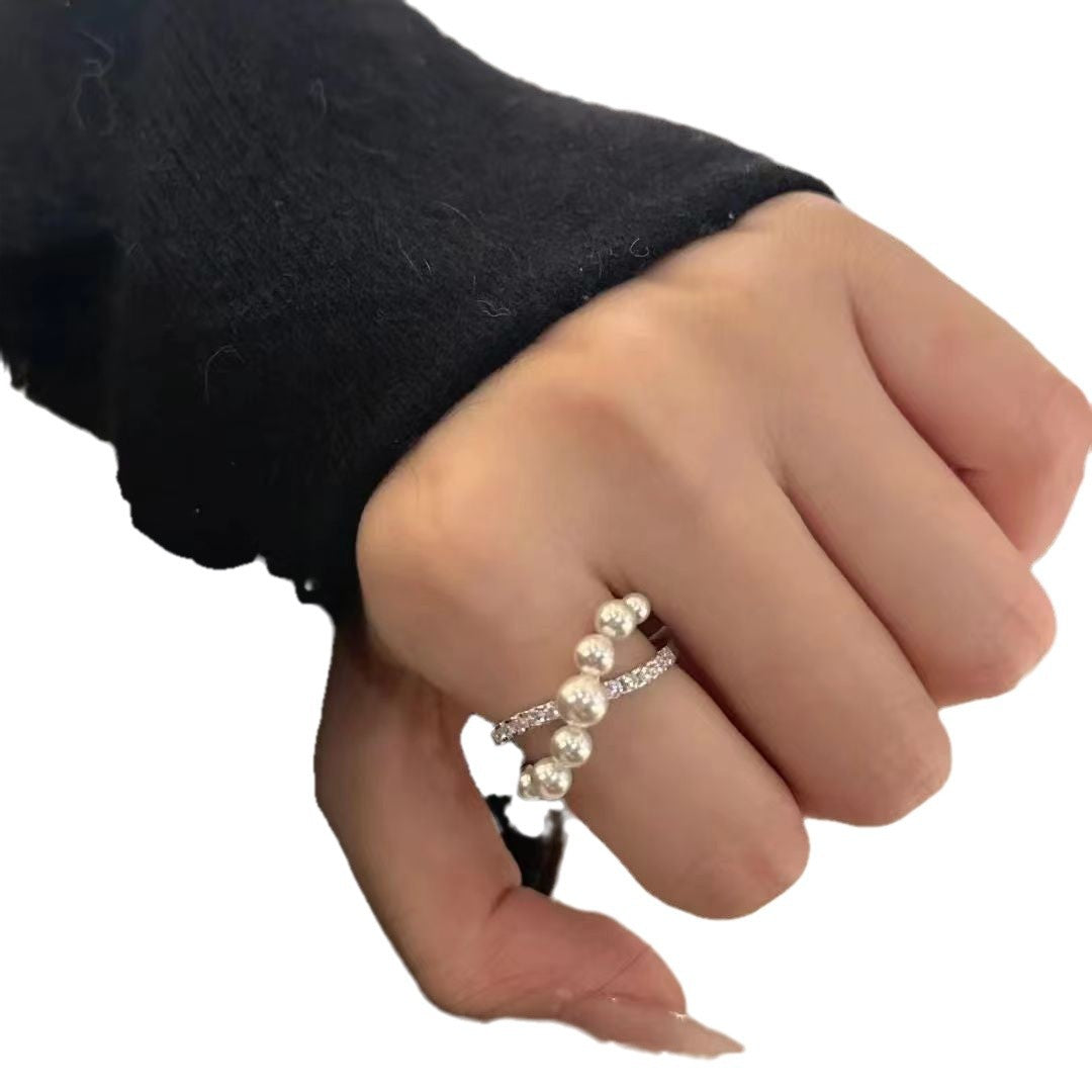 Französischer Perlenring mit gekreuztem Design