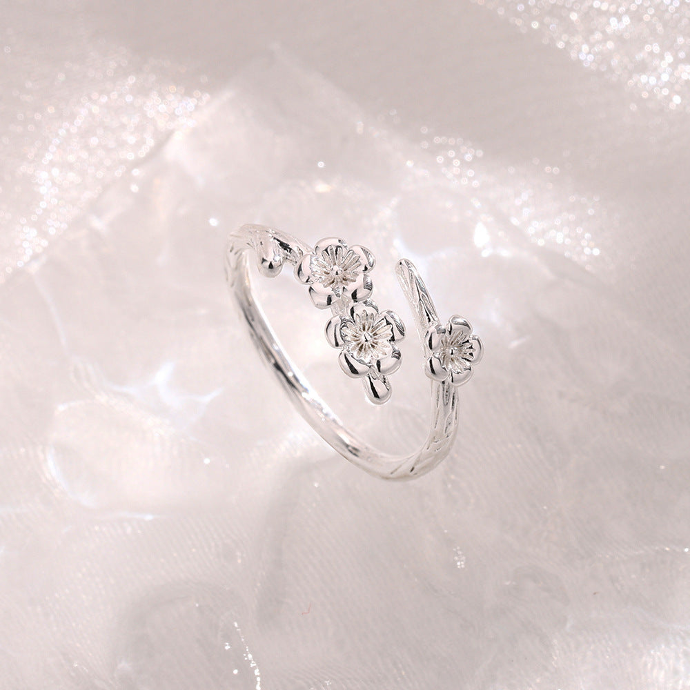 Retro Ring mit Pfirsichblüten-Design und Baumzweig-Struktur
