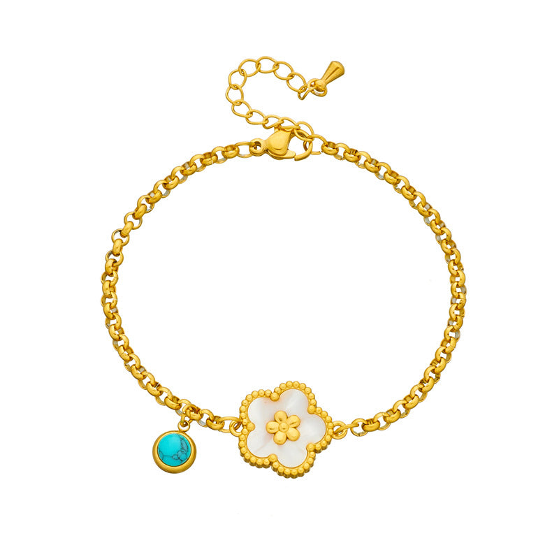 Blumenarmband mit dekorativem Anhänger in Goldoptik