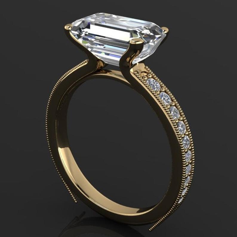 Eleganter Damen Goldring mit kleinem Diamant