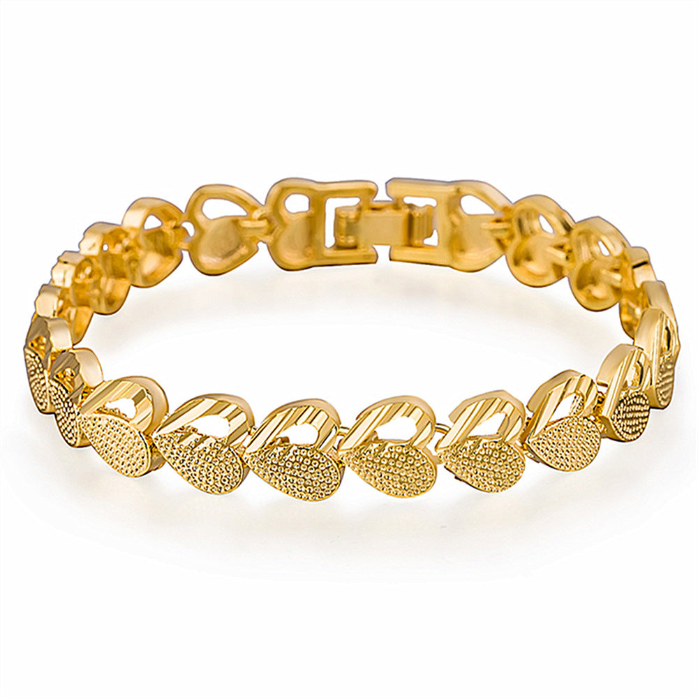 Herzförmiges Armband aus Kupfer mit Goldbeschichtung