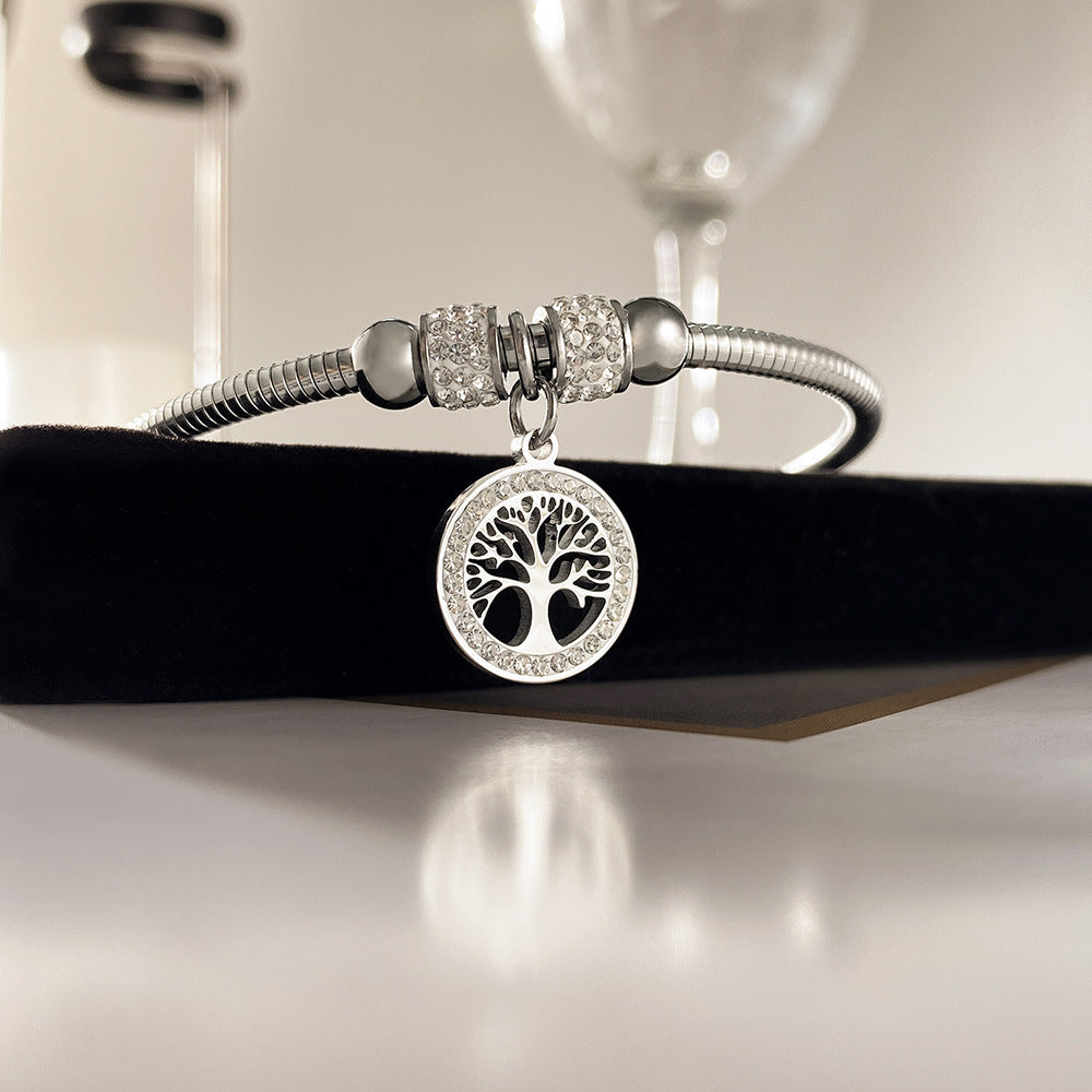 Armband mit Lebensbaum-Anhänger und Kristallakzent aus Edelstahl – elegantes Design